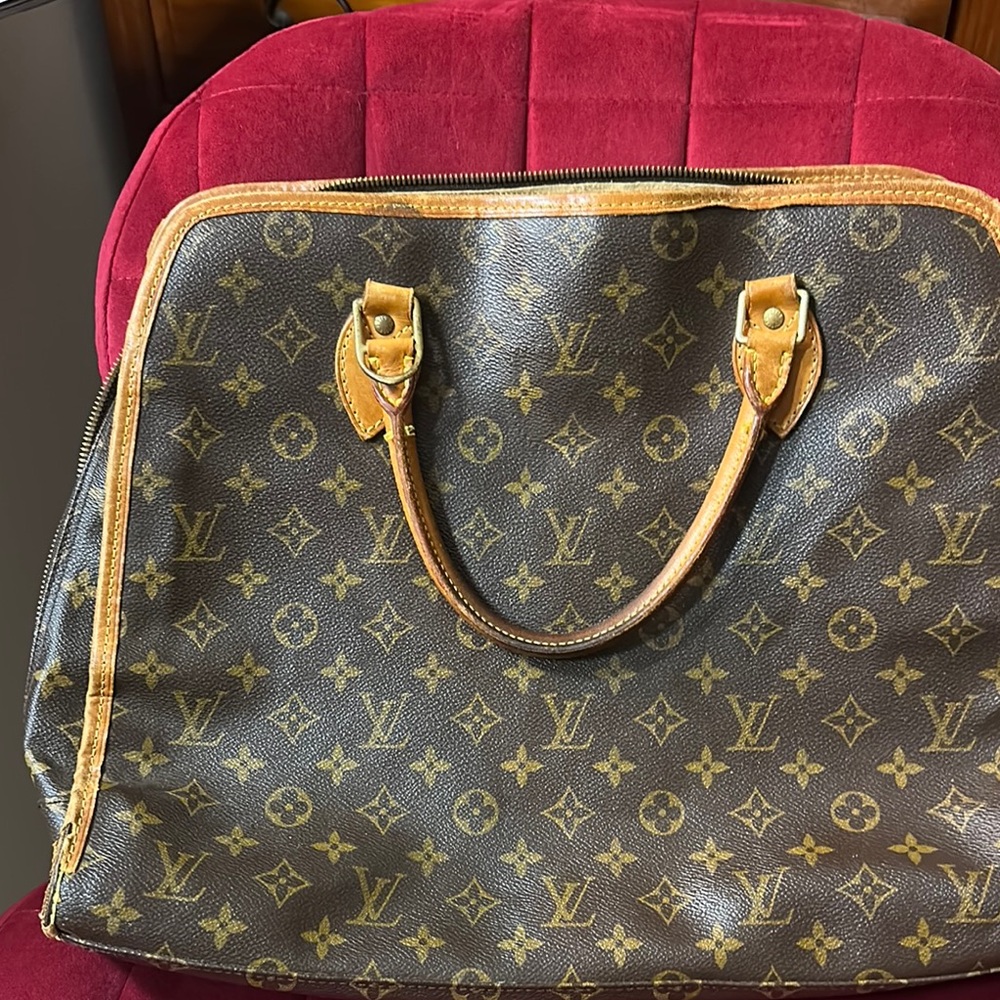 Louis Vuitton Brown Travel Bag with Iconic Monogram